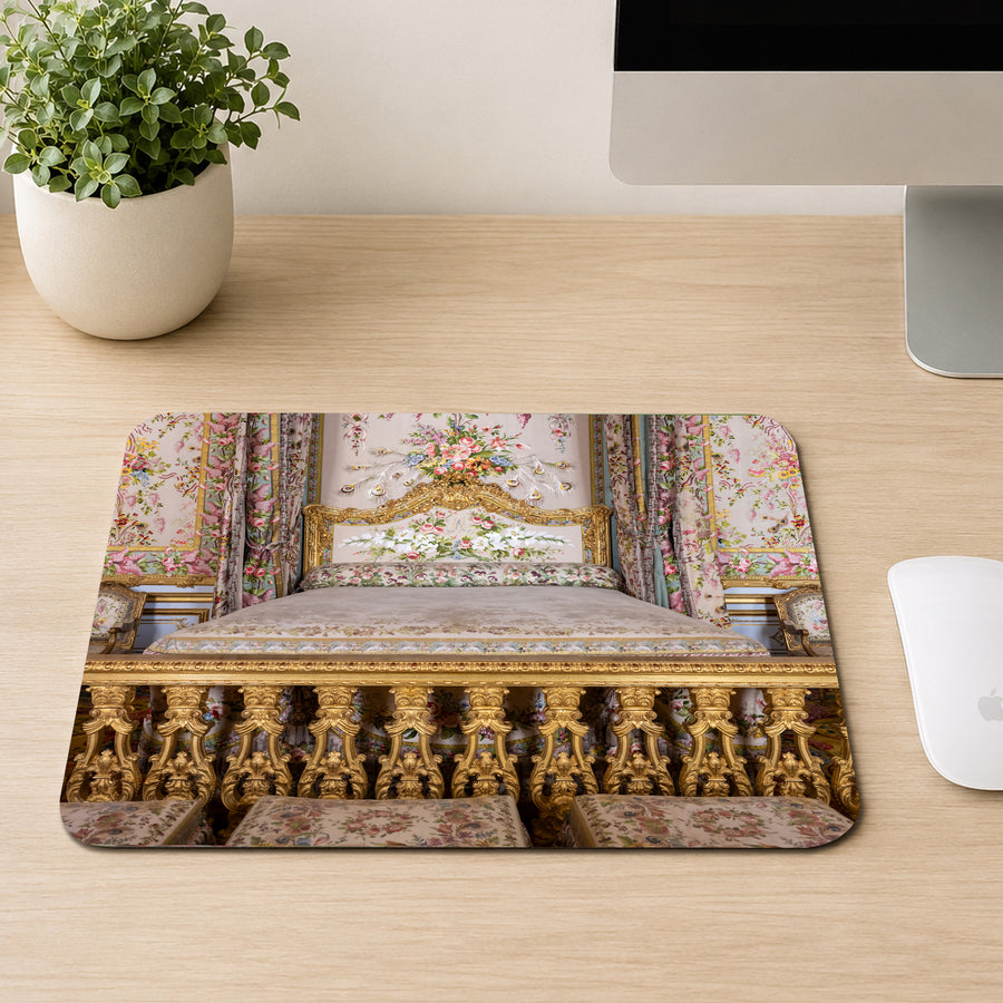 Marie Antoinette style royal bedroom at Versailles with gold gilded railing, floral tapestry, and ornate bed, printed on a mouse pad
