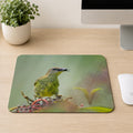 Female Green Honeycreeper with olive green feathers and a curved bill perched among berries, printed on a mouse pad