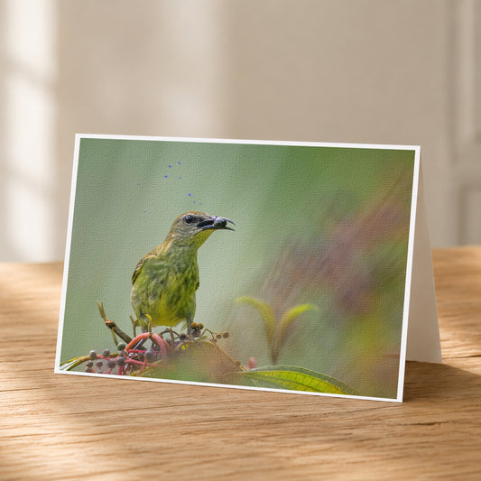 A green bird perched on a branch, surrounded by flowers and foliage, is the focal point of the image.