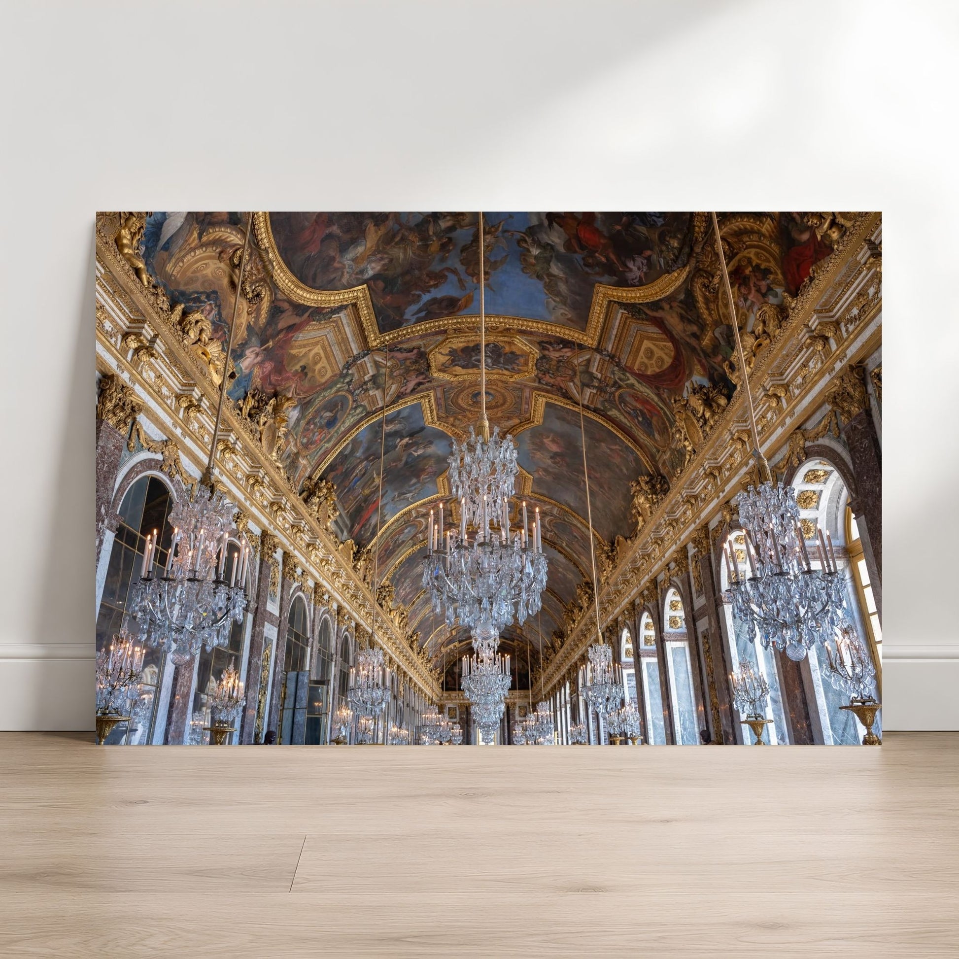 a grand, ornate hall with a high ceiling, intricate gold and blue decorations, and numerous crystal chandeliers hanging from the ceiling.
