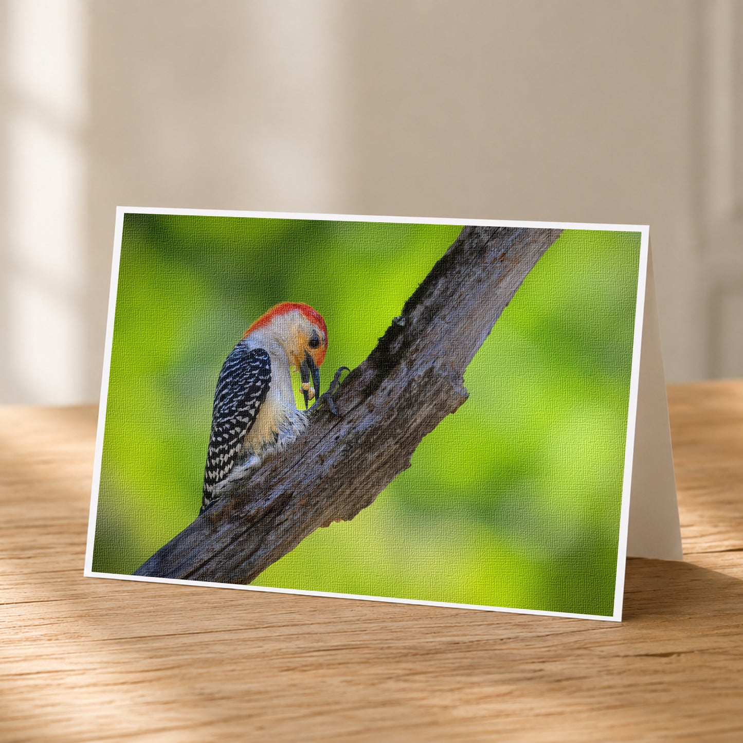 A colorful bird, possibly a woodpecker, perched on a tree branch.