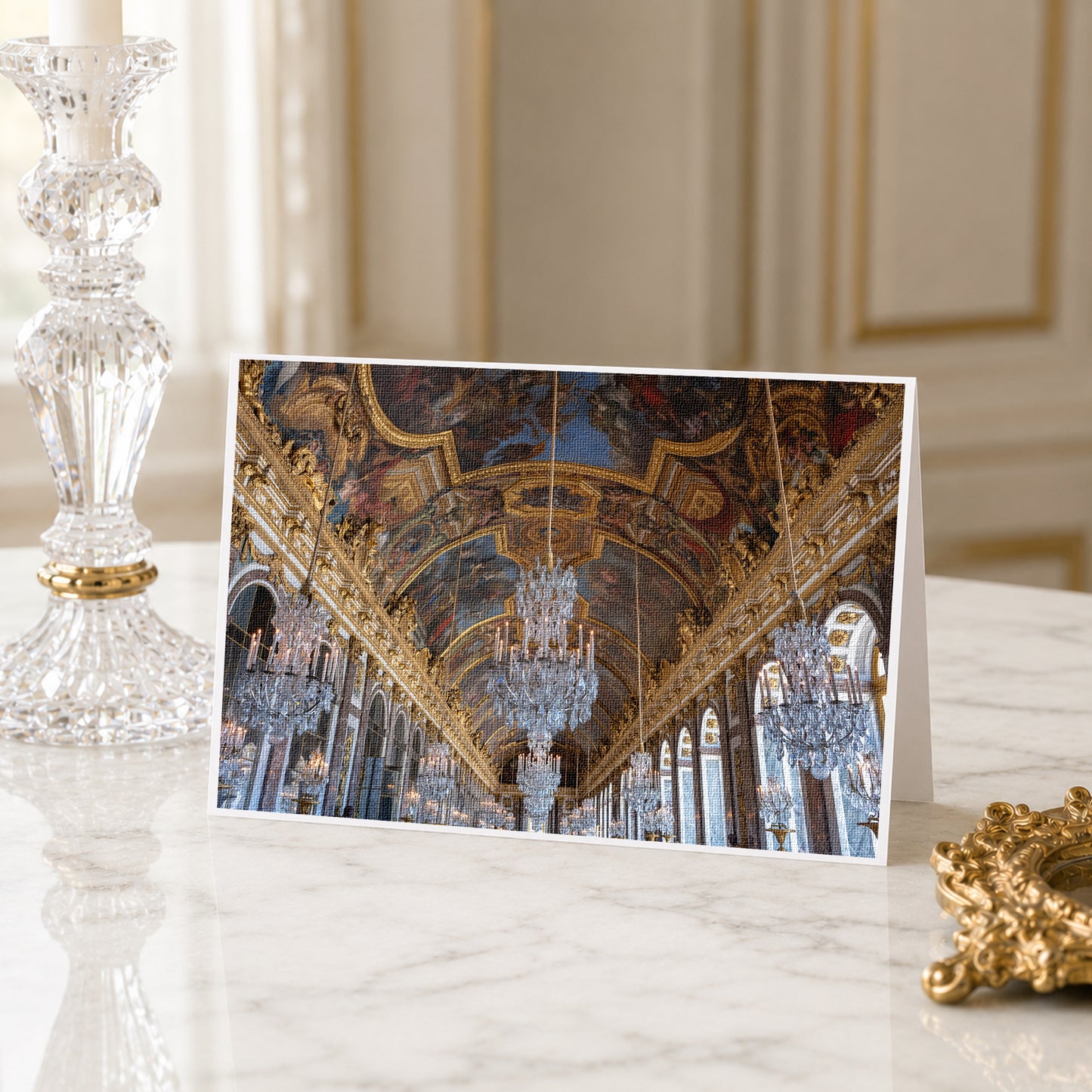 a large, ornate chandelier in a grand, opulent room with intricate architectural details and a high ceiling.