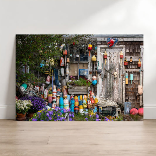 Bearskin Neck Fishing Shack fine art photography print featuring weathered wood, lobster buoys, ropes, flowers, and coastal New England charm