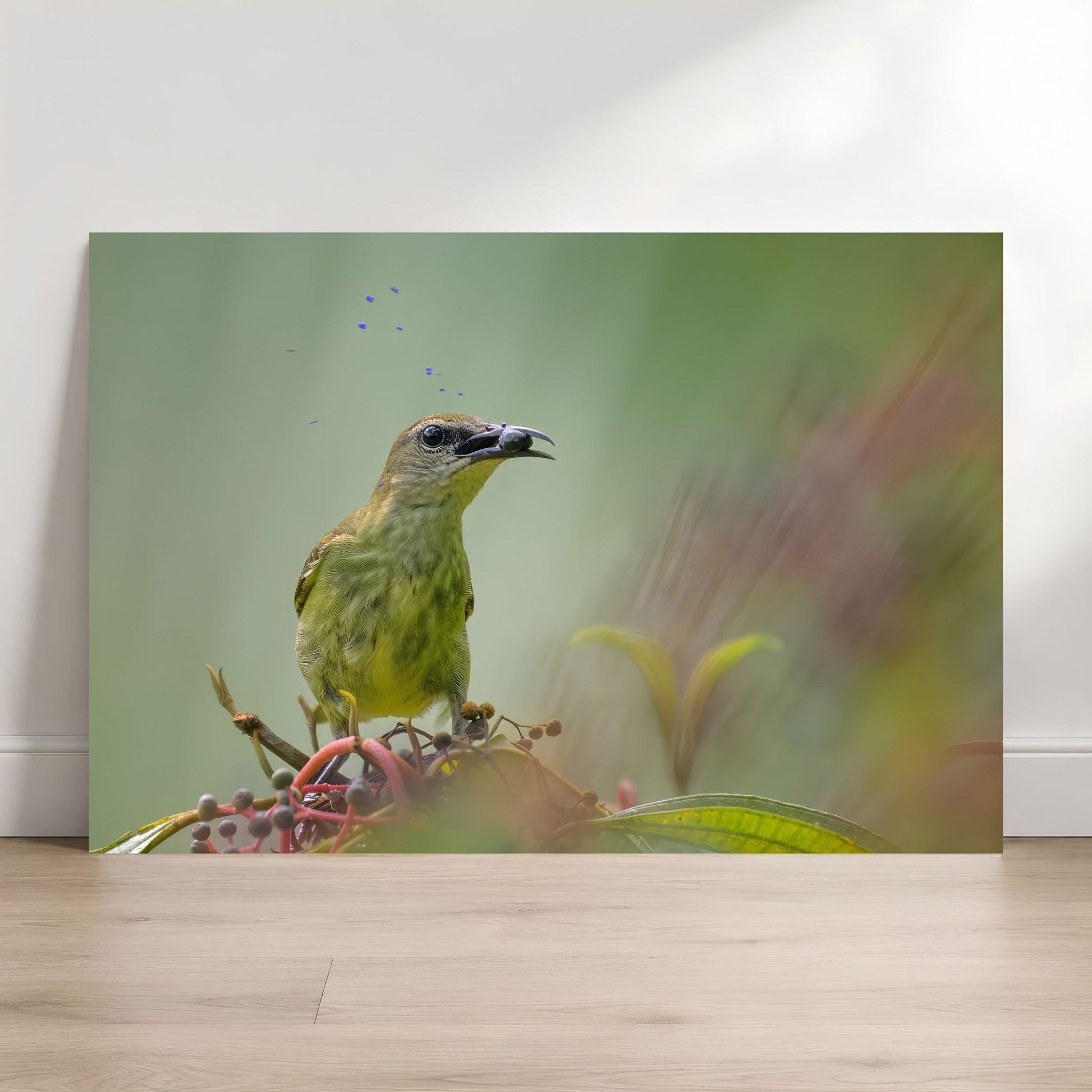 Bird on a branch with a blurred natural background