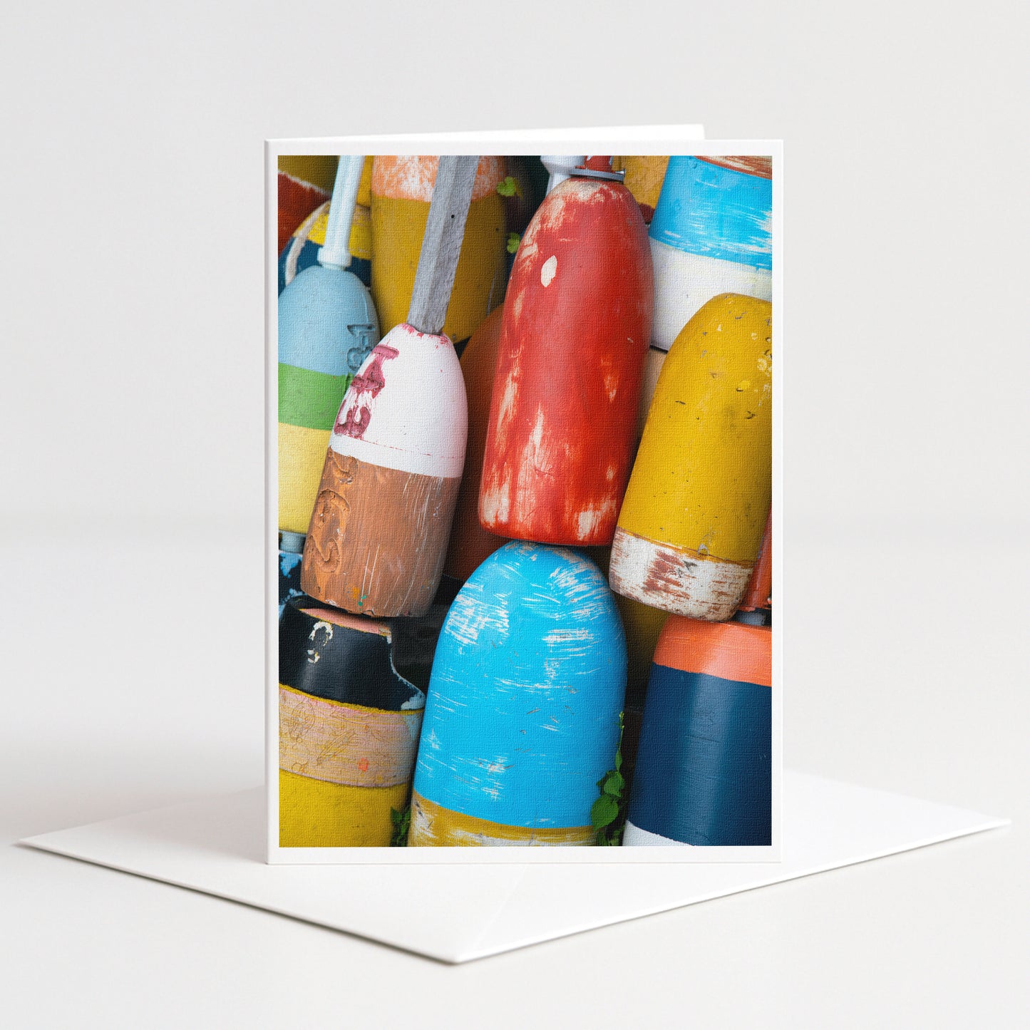 A collection of colorful buoys and buoys in various shapes and sizes, creating a vibrant and visually interesting display.