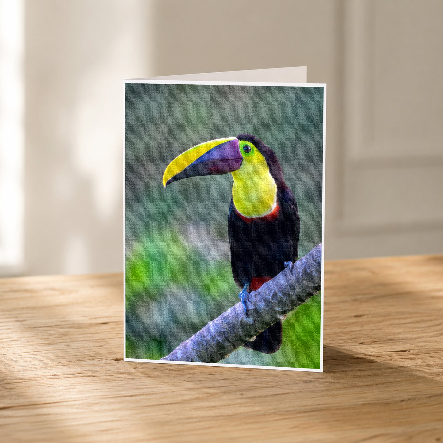 A colorful toucan perched on a branch, with its vibrant yellow beak and black and red plumage.